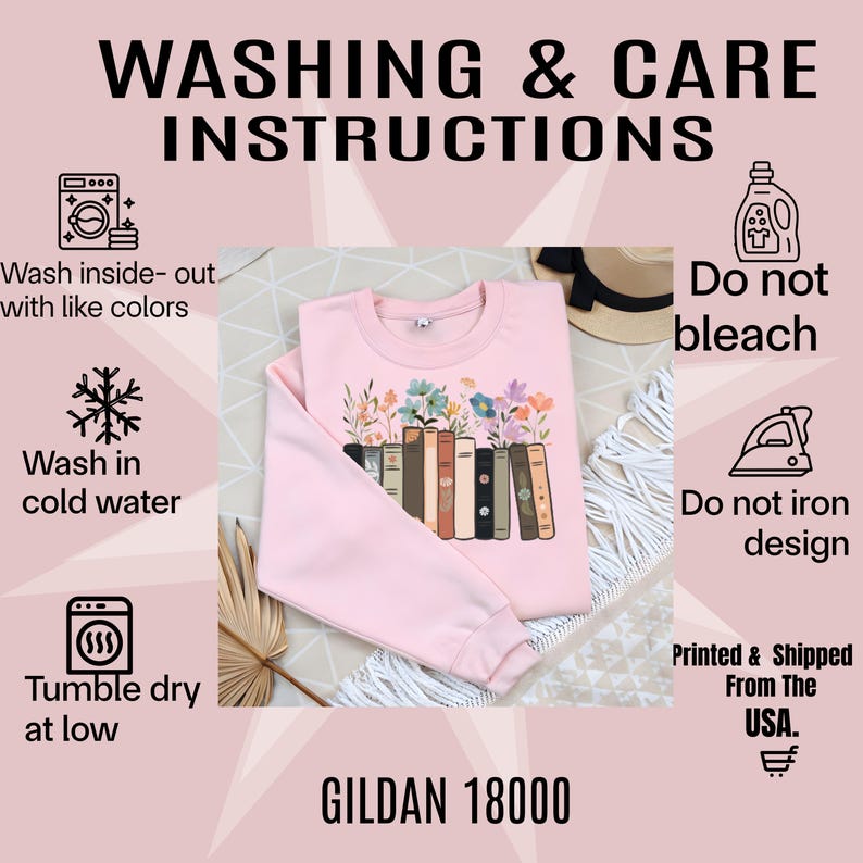 May include: A light pink sweatshirt with a floral and book design. The image includes washing and care instructions: wash inside-out with like colors, wash in cold water, tumble dry at low, and do not bleach or iron the design. The text "GILDAN 18000" is also visible.