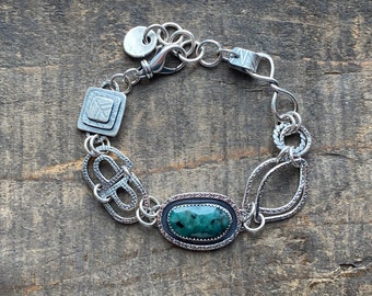 Emerald bracelet by teresamatheson, rose cut emerald, asymmetric bracelet, handmade chain