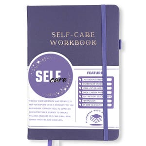 May include: A purple Self-Care Workbook with gold lettering and an elastic band closure. The cover features the words "SELF-CARE WORKBOOK" and a circular design with the words "SELF care". Includes stickers, a pen holder, and is A5 size (5.8 x 8.5 inches).