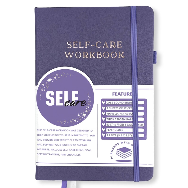 May include: A purple Self-Care Workbook with gold lettering and an elastic band closure. The cover features the words "SELF-CARE WORKBOOK" and a circular design with the words "SELF care". Includes stickers, a pen holder, and is A5 size (5.8 x 8.5 inches).