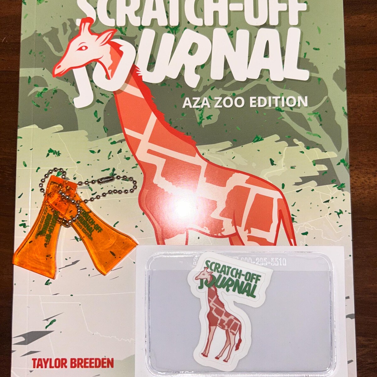 Scratch-off journal for zoos and aquariums