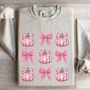 pink pumpkins sweater
pink pumpkin shirt
pink pumpkin sweater