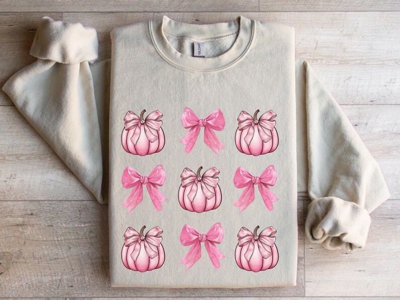 pink pumpkins sweater
pink pumpkin shirt
pink pumpkin sweater