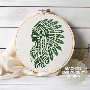 May include: Machine embroidery design of a woman wearing a green headdress with feathers. The design is on a white hoop.