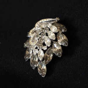 WEISS Smoky Gray Black Diamond Vintage Rhinestone Brooch with Clear Rhinestones.