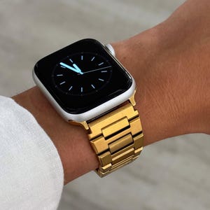 Correa de acero inoxidable dorado para Apple Watch: pulsera unisex de eslabones metálicos