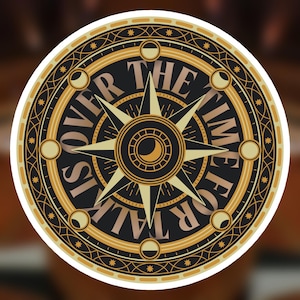 May include: Circular sticker with a compass design in black, gold, and cream. The text "IS OVER THE TIME FOR TALK" is arranged around the compass. The design includes stars and moon shapes.