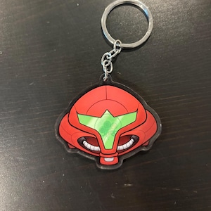 Samus Helmet and Metroid Keychain