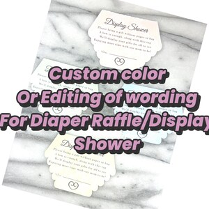 May include: A collection of small, scalloped-edge cards with text, including "Display Shower" and "For Diaper Raffle/Display Shower." The cards are in pastel shades, with text in a classic font. The image also includes text that says "Custom color Or Editing of wording."