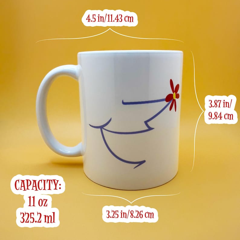 A photo of the front of the mug with measurements. The width of the mug with the handle is 4.5 inches or 11.43 centimeters. The height of the mug is 3.87 inches or 9.84 centimeters. The width of the mug without the handle is 3.25 inches or 8.26 centimeters. The capacity is 11 ounces or 325.2 milliliters.