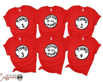 May include: Red t-shirts with white circular designs featuring the text "Thing 1", "Thing 2", "Thing 3", "Thing 4", "Mother of All Thing", and "Father of All Thing". The shirts are short-sleeved.