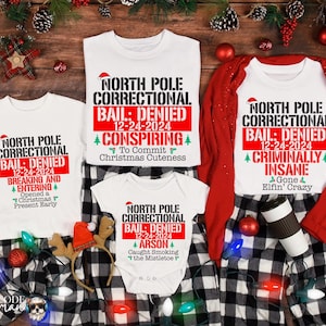 Nordpol-Korrektur-Weihnachtsfamilien-Shirts: Lustige passende Gruppen-T-Shirts