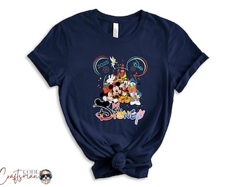 May include: Navy blue t-shirt featuring a colorful graphic of Disney characters, including Mickey and Minnie Mouse, Donald Duck, and Goofy. The design includes the text "2025 Dad" and the Disney logo. The shirt is knotted at the bottom.