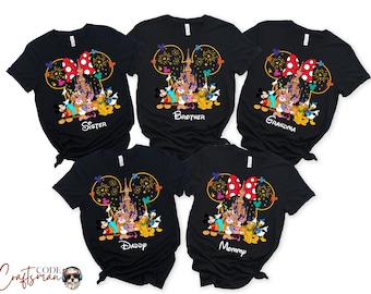 May include: Five black t-shirts with a Mickey Mouse silhouette and a Disney castle graphic. Each shirt has a different word printed on the bottom: Sister, Brother, Grandma, Daddy, Mommy.