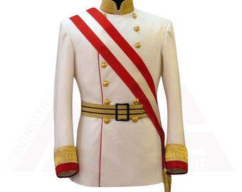 May include: A white military-style jacket with gold buttons, trim, and a black and gold belt. A red and white sash is draped across the front. The cuffs are red with gold embroidery. A formal jacket.