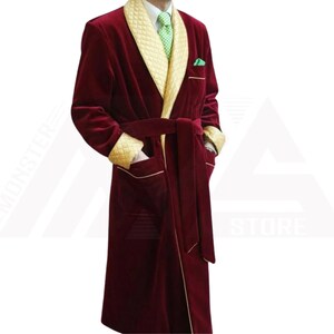 May include: A burgundy velvet robe with a gold satin trim and a matching belt. The robe has a shawl collar and two pockets.
