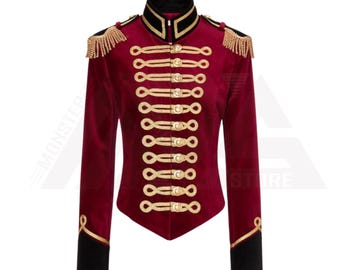May include: A red velvet jacket with gold braid trim and buttons. The jacket has a stand-up collar and long sleeves.