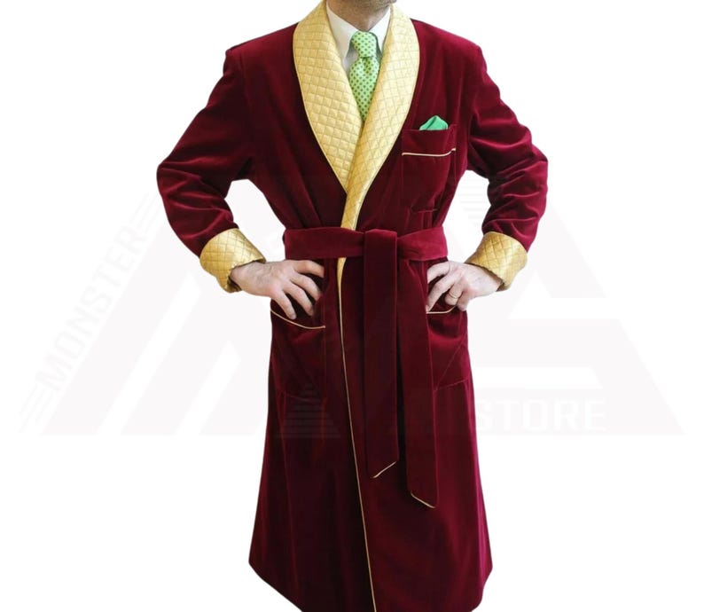 May include: A long, red velvet robe with a gold quilted collar and trim. The robe has a sash and two pockets.