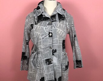nike newsprint jacket ladies