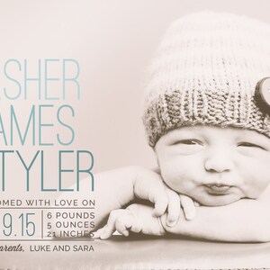 May include: A newborn baby boy named Asher James Tyler, wearing a knitted hat with a button, is pictured on a light brown background. The baby is 6 pounds, 5 ounces, and 21 inches long. The text "Welcomed with love on 10.09.15" is displayed above the baby's image. The text "proud parents, LUKE AND SARA" is displayed below the baby's image.
