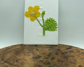 Yellow Buttercup fiber art embroidery