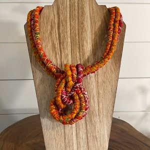 Bright orange red yellow knotted necklace statement necklace