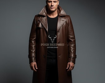 May include: A brown leather trench coat with a wide collar and button closure. The coat has a classic design and is knee-length. The text "POSH BESPOKE LEATHER GOODS" is printed on the coat.