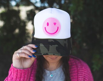 Camo Snap Back Trucker Hat with Pink Happy Smiley Face Patch