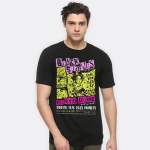May include: Black t-shirt with a graphic print of a concert poster for Black Stones. The poster features a band of cartoon characters and the text "feel the blast! NANA TOKYO DOME 2001年11月23日 FRI曜日 ¥3,900 ¥2,500".