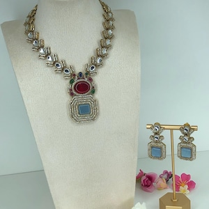 Premium quality Kundan necklace set with earrings in baby blue