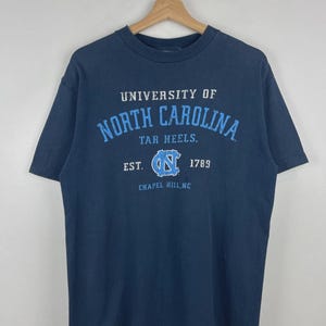 Vintage 90s North Carolina Tar Heels University Navy Tee Size M image 1