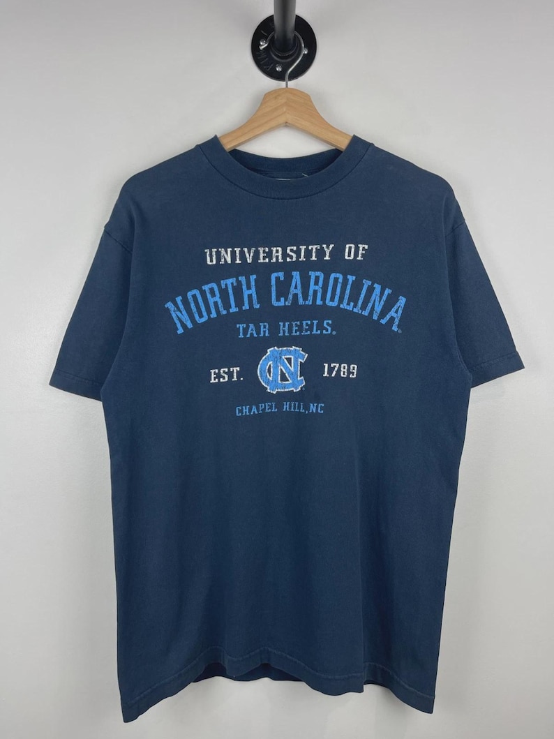 Vintage 90s North Carolina Tar Heels University Navy Tee Size M image 1