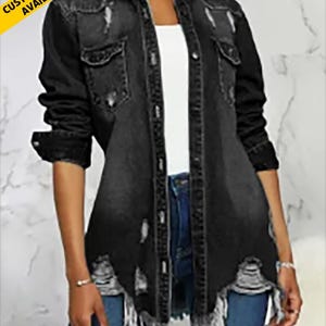 May include: A black denim jacket with distressed details and frayed edges. The jacket has a button-up front and long sleeves.