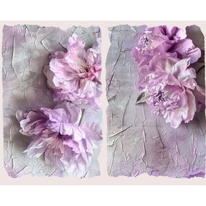 May include: A close-up of three pink peonies on a textured, gray background. The peonies are arranged in a cluster, with their petals overlapping.