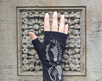 Merino wool fingerless gloves - black, printed with Kowhai flower. black fingerless armwarmers