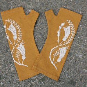 Merino wool fingerless gloves - mustard printed with Kowhai flower, ochre fingerless armwarmers