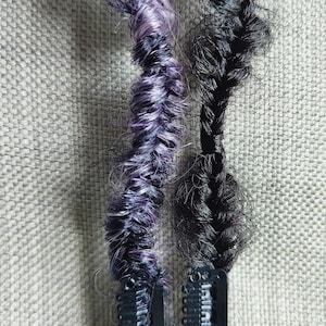 2 X fishtail braids on snap clips, black and purple
