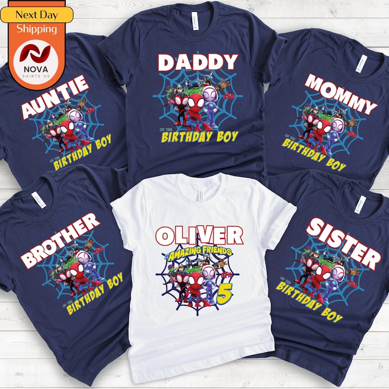 May include: Set of six navy blue and white t-shirts featuring a Spiderman theme with the text "Auntie", "Daddy", "Mommy", "Brother", "Sister", and "Oliver Amazing Friends" with the number 5. Each shirt has the text "Of the Birthday Boy" printed on it.