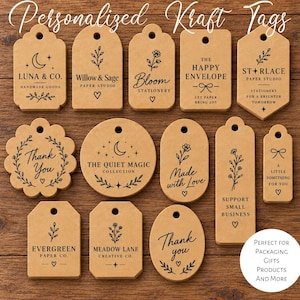 May include: A collection of twelve brown kraft paper tags in various shapes, including rectangular, circular, and scalloped, each featuring black printed text and botanical or celestial line art designs with a hole at the top for hanging.