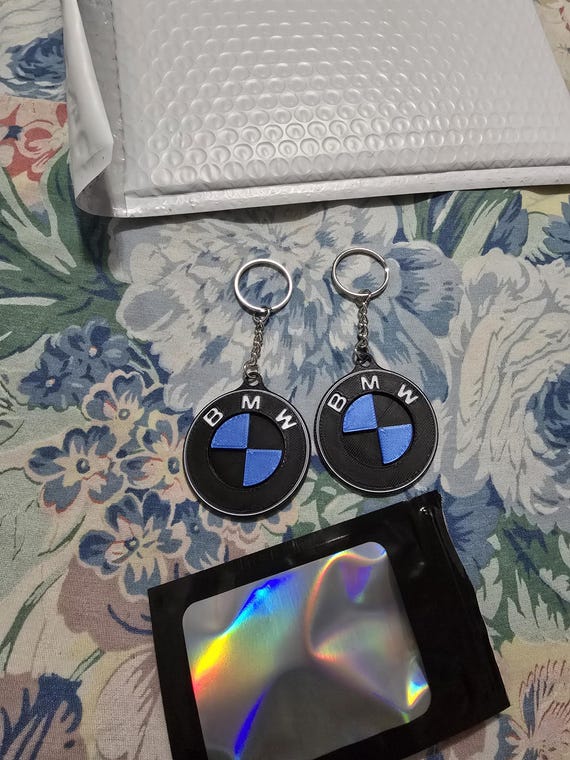 thumbnail image 2 of BMW Logo Metal & Glass Keychain – Black Round Key Ring 2 of 6