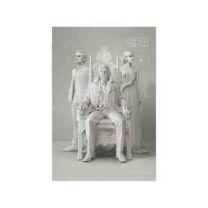May include: A black and white image of three people standing in front of a throne. The people are all wearing formal attire and the throne is decorated with intricate carvings. The text "UNITED FOR YOU" is displayed at the top of the image.
