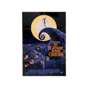 May include: A film poster for Tim Burton's "The Nightmare Before Christmas." The image shows a full moon, a swirling hill, and Jack Skellington. The title is in orange and white, with pumpkins and a graveyard in the foreground.