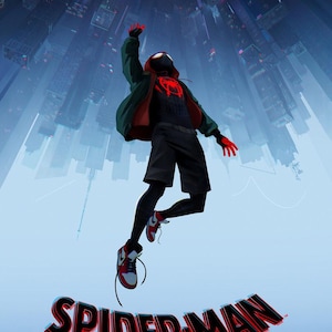 May include: Poster for the animated film "Spider-Man: Into the Spider-Verse." The image features the Spider-Man character in a dynamic pose against a backdrop of a cityscape. The film's title is prominently displayed, along with the text "Only on the Big Screen Christmas."