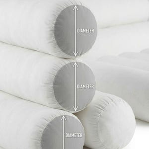 May include: Close-up of white cylindrical pillows with gray end caps. The word "DIAMETER" is printed on the image with a white arrow indicating the measurement. The pillows are stacked on top of each other.