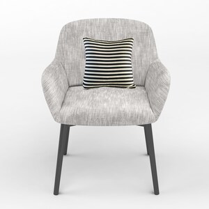 May include: A gray upholstered armchair with black legs and a black and white striped pillow.
