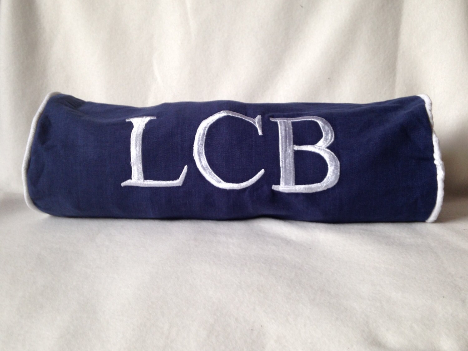monogram bolster pillow