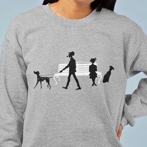 Unisex Heavy Blend Sweatshirt with Subtle 101 Dalmatians Minimal Design Purdita and Roger Silhouette in the Park Disney Aesthetic