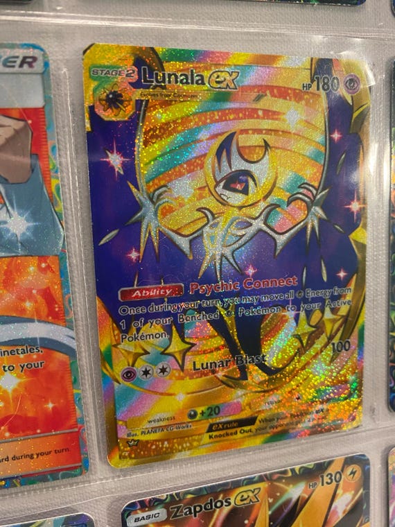 lunala pokemon card value Amazon.com: Pokémon TCG: Lunala GX Box | A Foil Promo Card | 4 Booster  Packs | A Oversize Foil Card main image 1