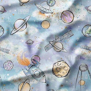 Whimsical Space Design with Planets, Rockets, and Satellites on Blue Cotton Fabric by the Yard - Fun Outer Space Pattern for Kids' Quilting