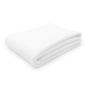 A white, folded blanket or towel is shown against a plain white background.